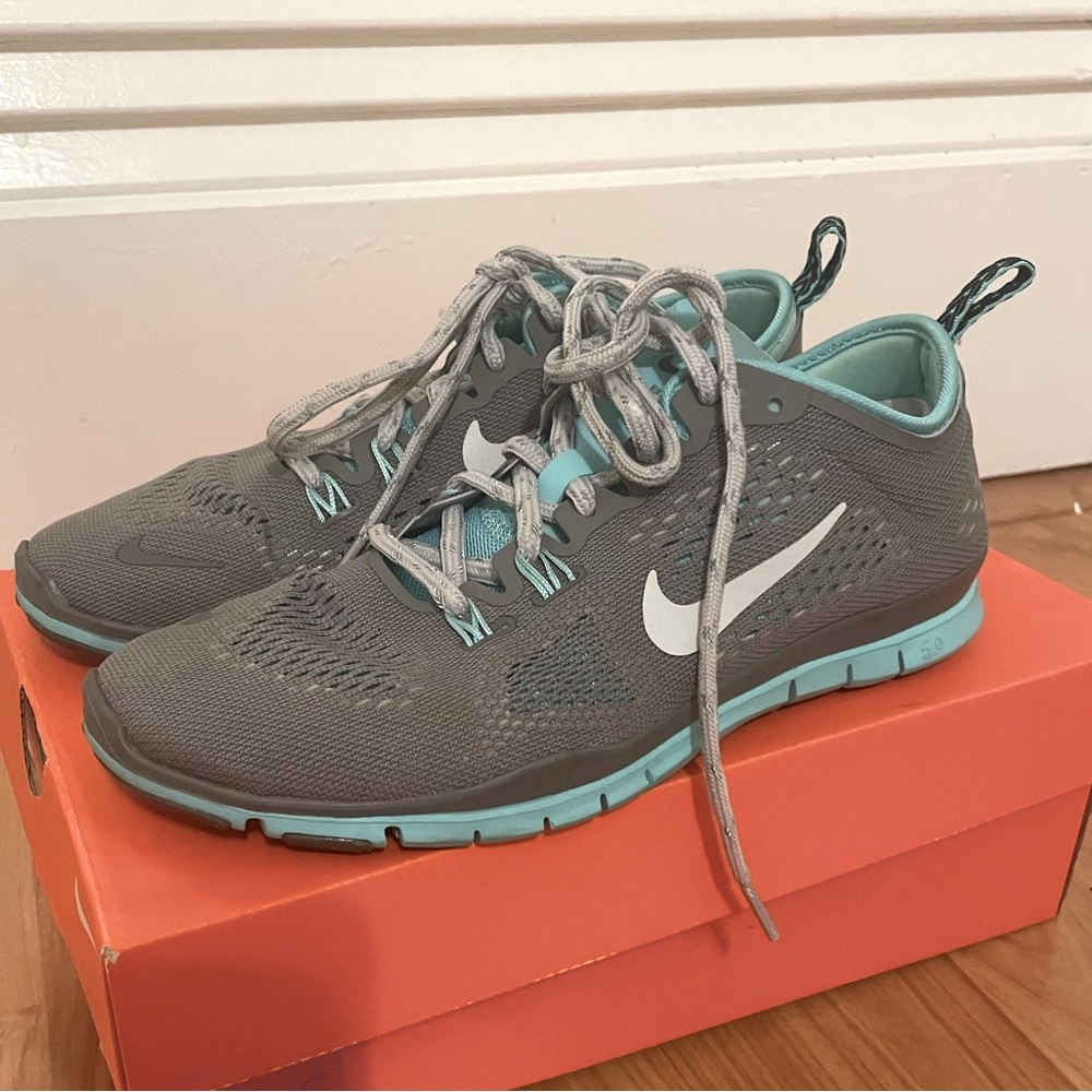 Gray and teal Nike free 5.0